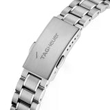 Close-up of a silver Tag Heuer watch clasp.