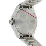 Back of a silver wristwatch.