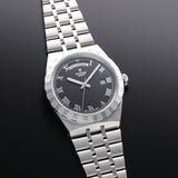 Tudor watch with black face and Roman numerals