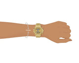 Gold wristwatch on wrist, MP000000015966965