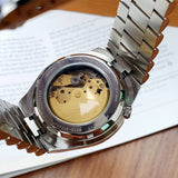 Citizen NJ0150-81A-1_1 watch back with visible movement