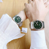 Tissot watch T137.207.11.091.00-3, green dial, on wrists