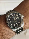 TAG Heuer Aquaracer watch on wrist