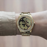 Guess G Twist Diamonds Gold Dial Gold Steel Strap Watch For Women - W1201L2