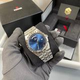 Tudor watch with blue face, image_a5aa83d1-871a-4a80-9a24-433c93930b8f