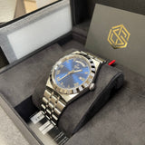 Tudor watch with blue dial - image_e9927ce0