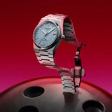 Tissot PRX Men's Watch on Red Background