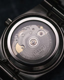 Winding Crowns Tissot watch back with visible movement